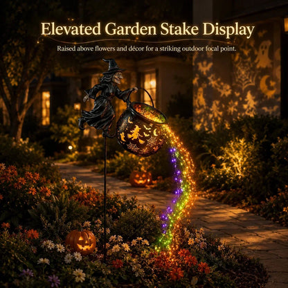 Elevated garden stake display for Halloween witch cauldron light